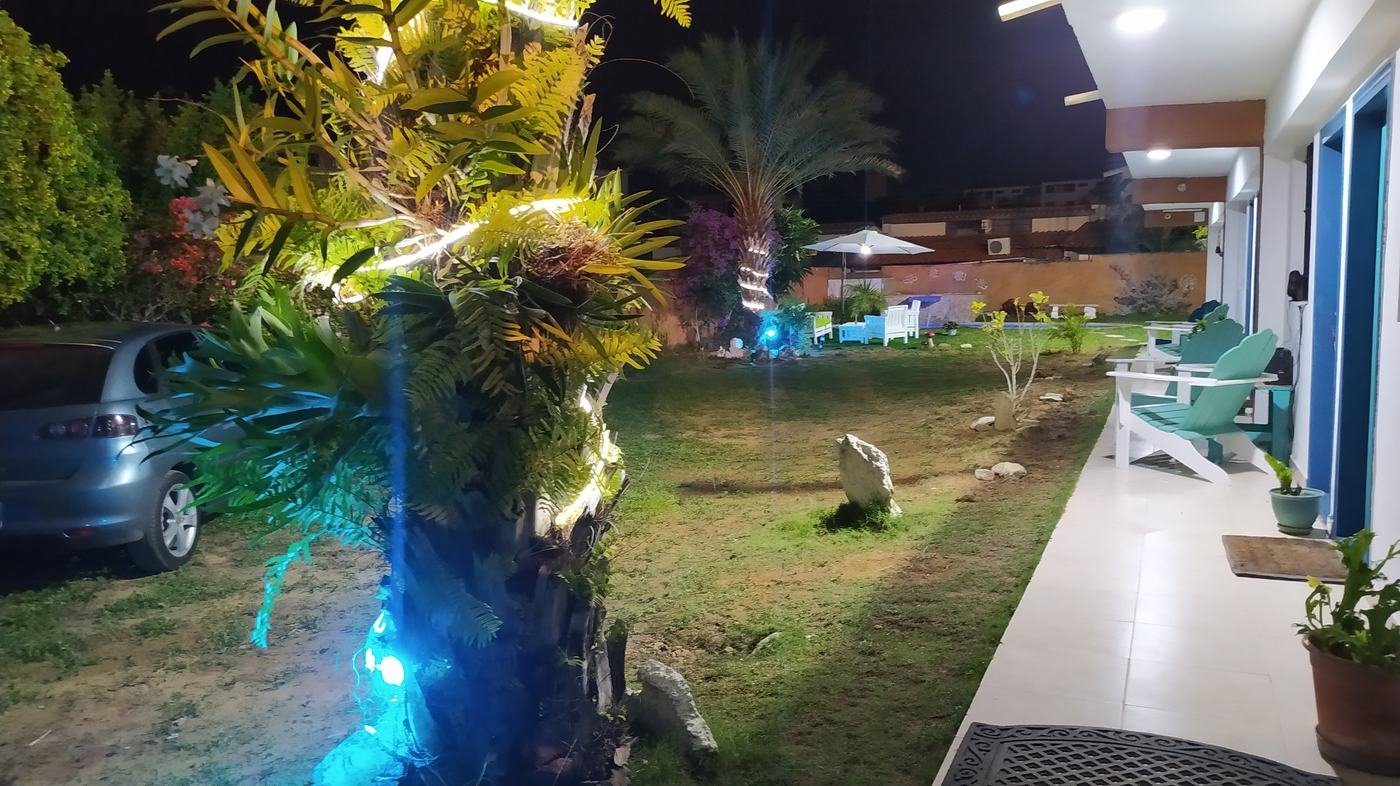Jardín de noche - Posada Villa Taormina
